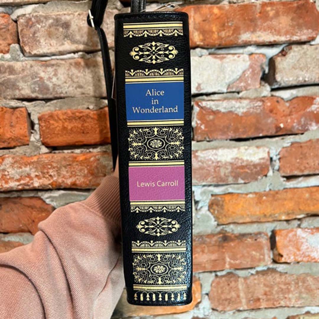 Spine of Alice in Wonderland storybookpurse with title and Author