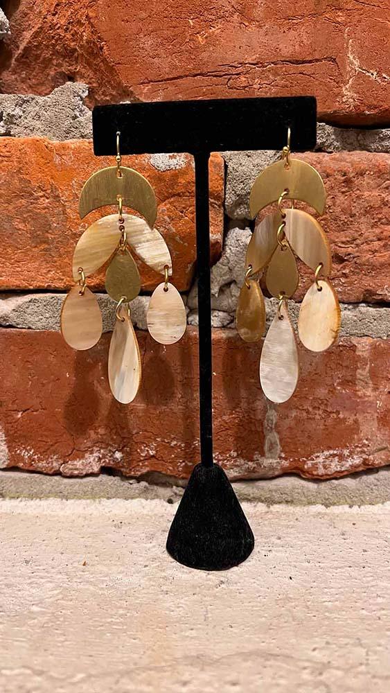 Carved horn chandelier earrings: multiple teardrop horn pieces on gold hooks
