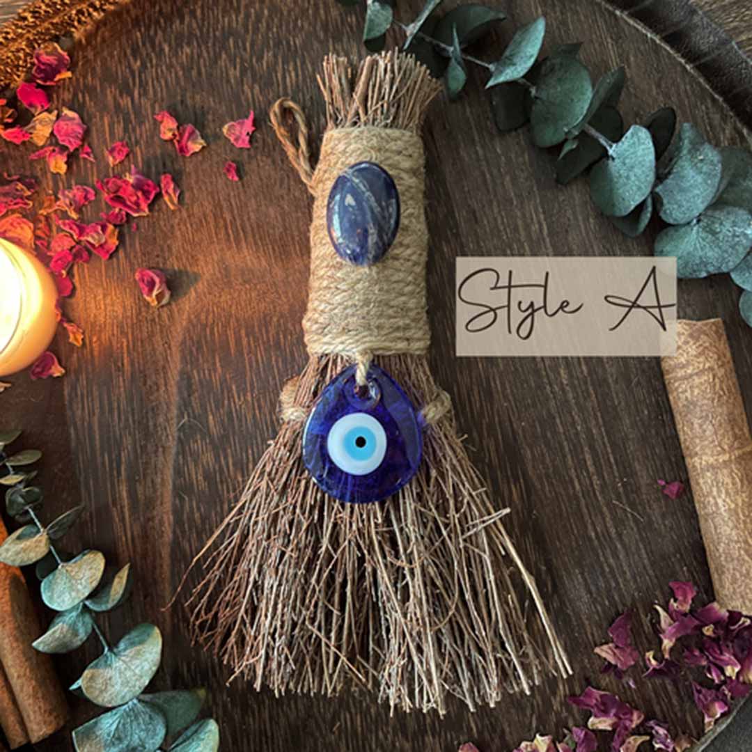 Cinnamon altar broom with blue evil-eye charm, straw handle (Style A)