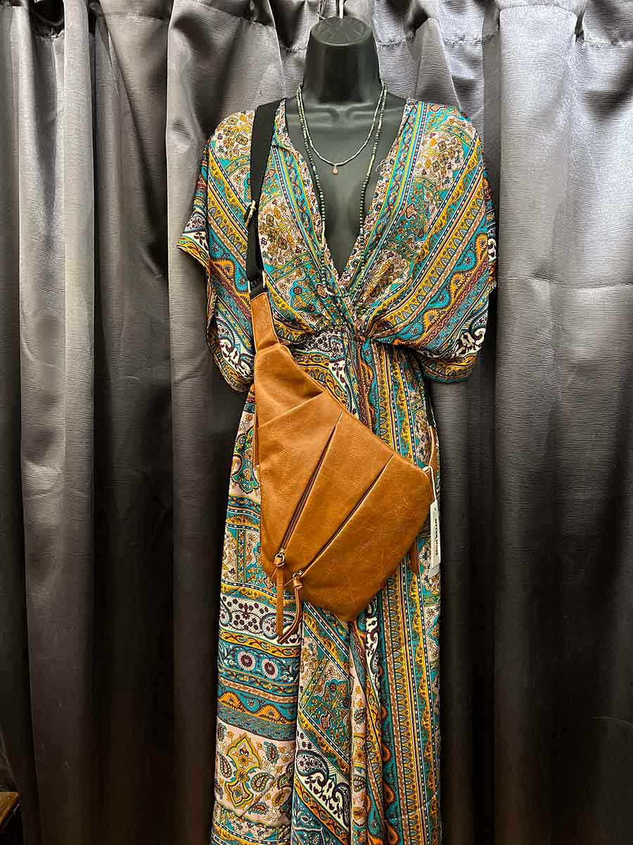 Upcycled sari maxi dress with teal, mustard, and gold paisley print V-neck and waist tie