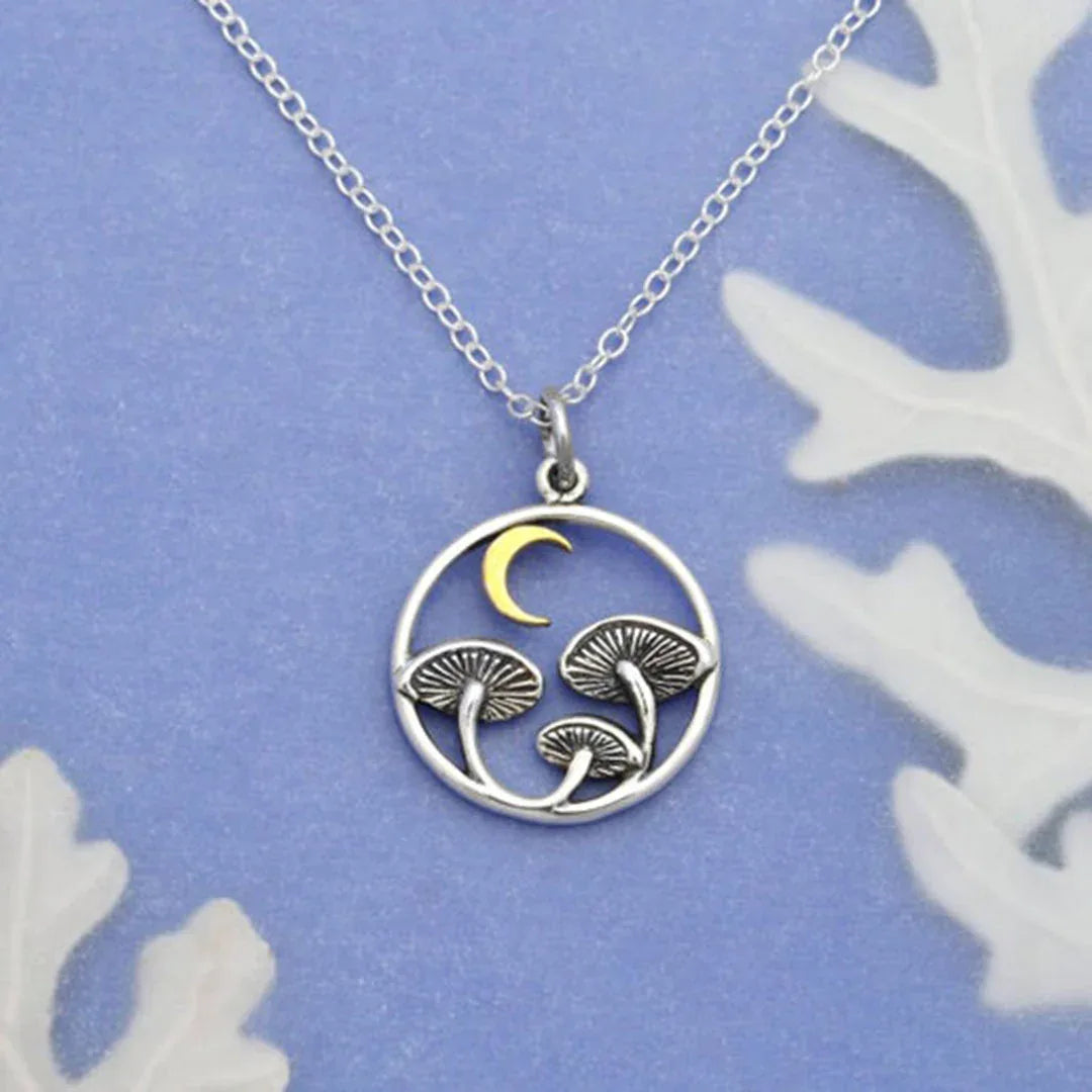 Sterling silver pendant necklace with bronze moon and mushroom scene, 18-inch chain