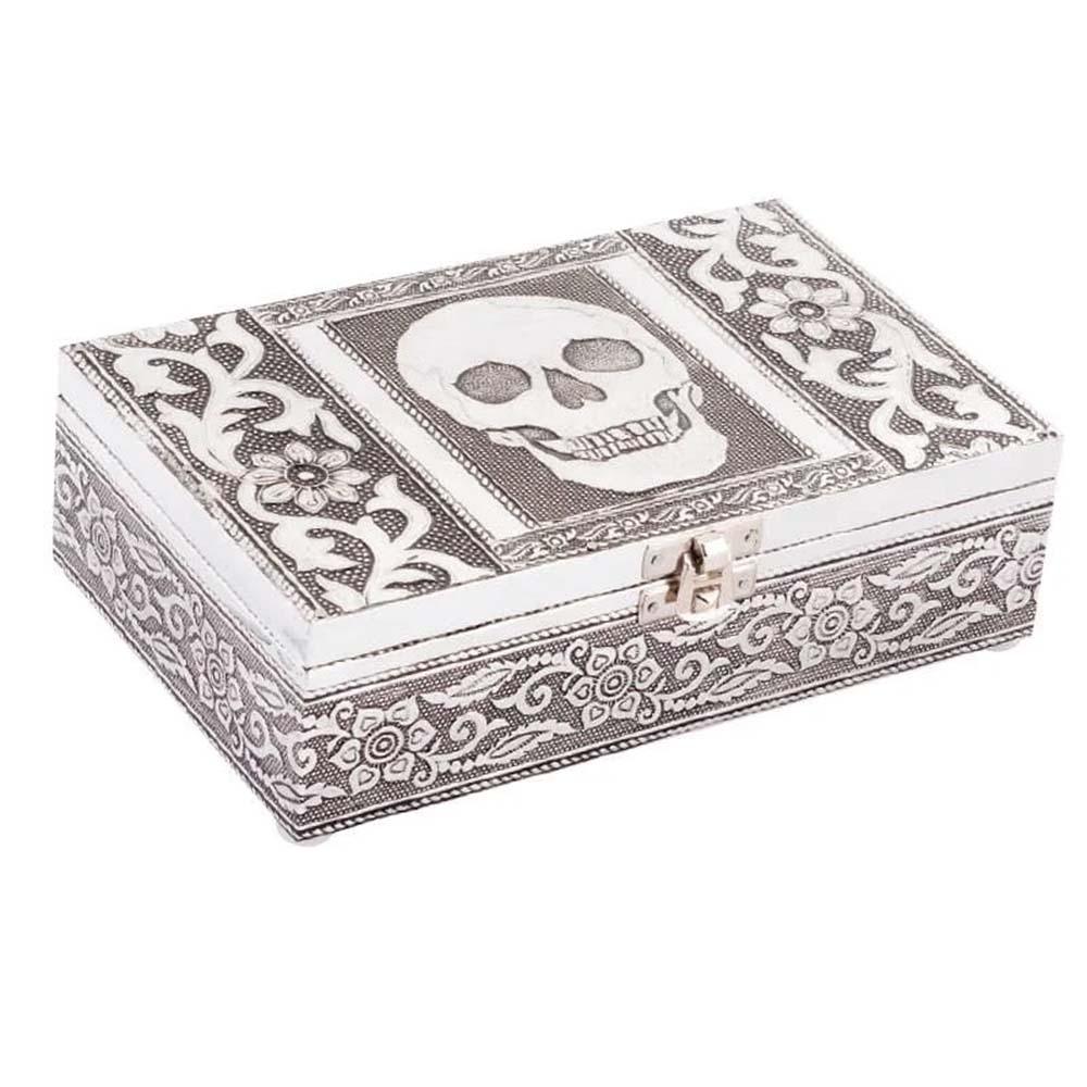 Skull tin jewelry box with ornate front panel and metal clasp