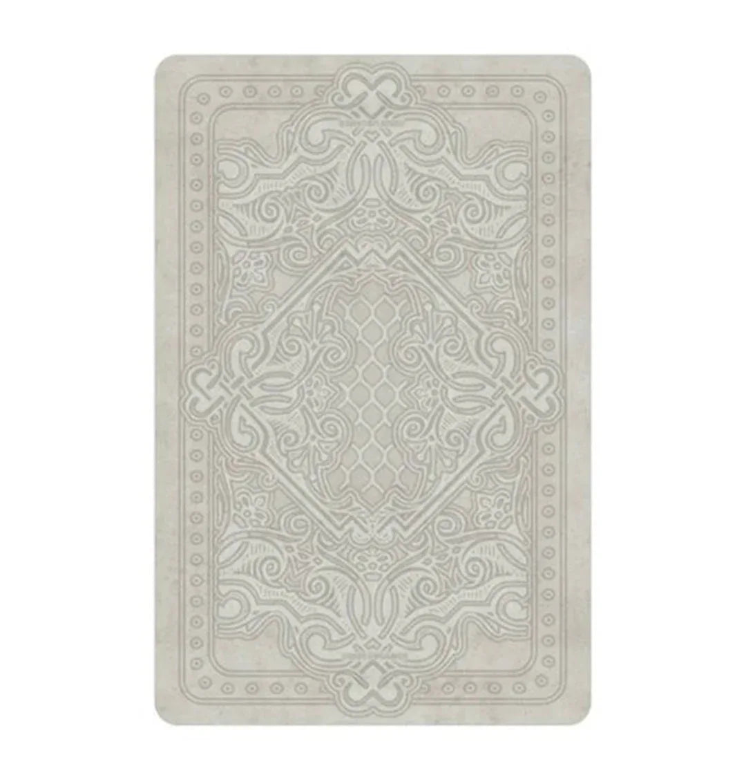 Tarotrückseite mit ornamentalem Rahmen und stilisiertem Herz/Blume im Zentrum