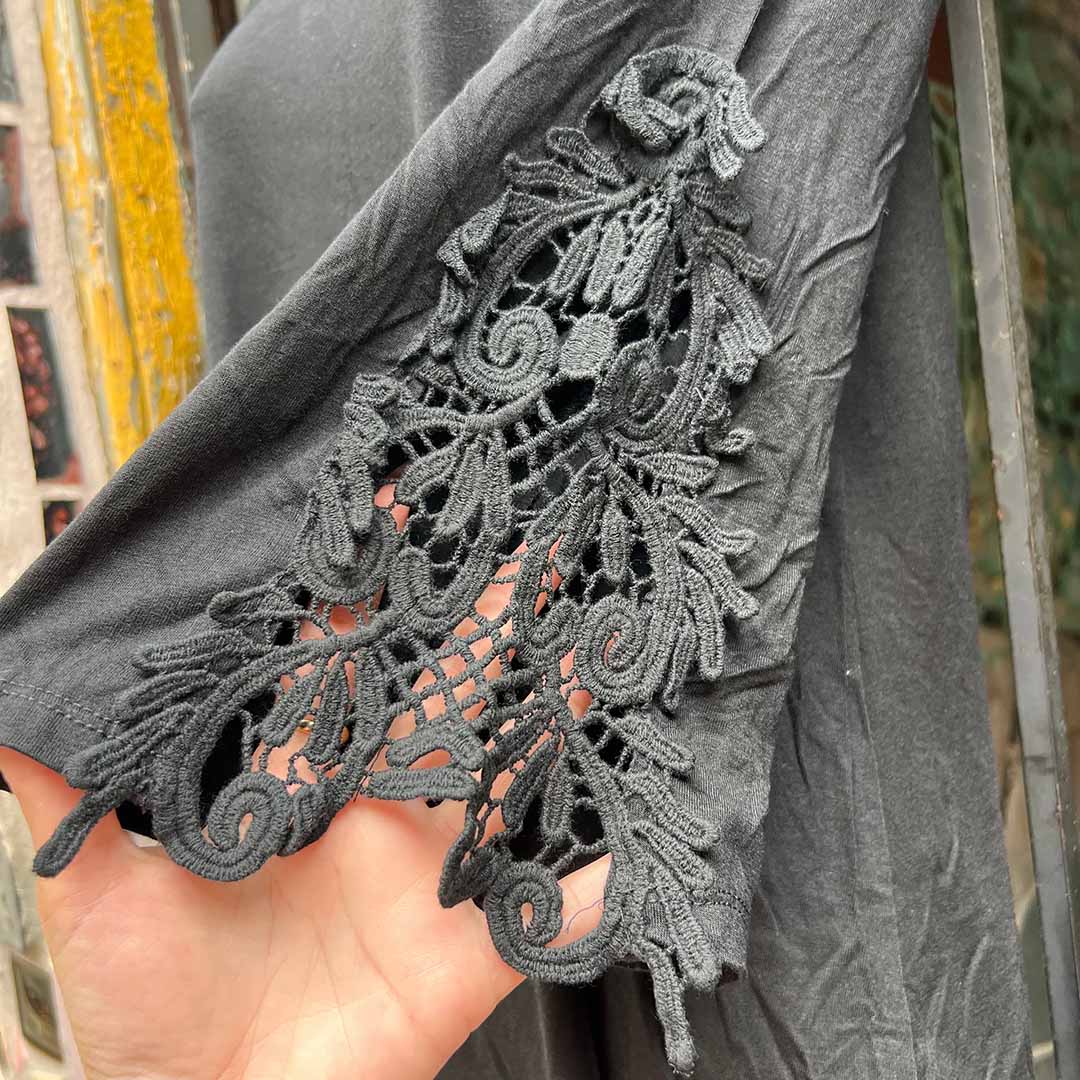 Grey tunic dress with detailed embroidered lace panel and orange accent stitching