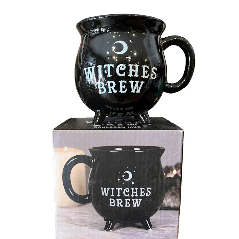 Witches Brew Cauldron mug in dark glossy black, “WITCHES BREW” moon-and-stars design, handle