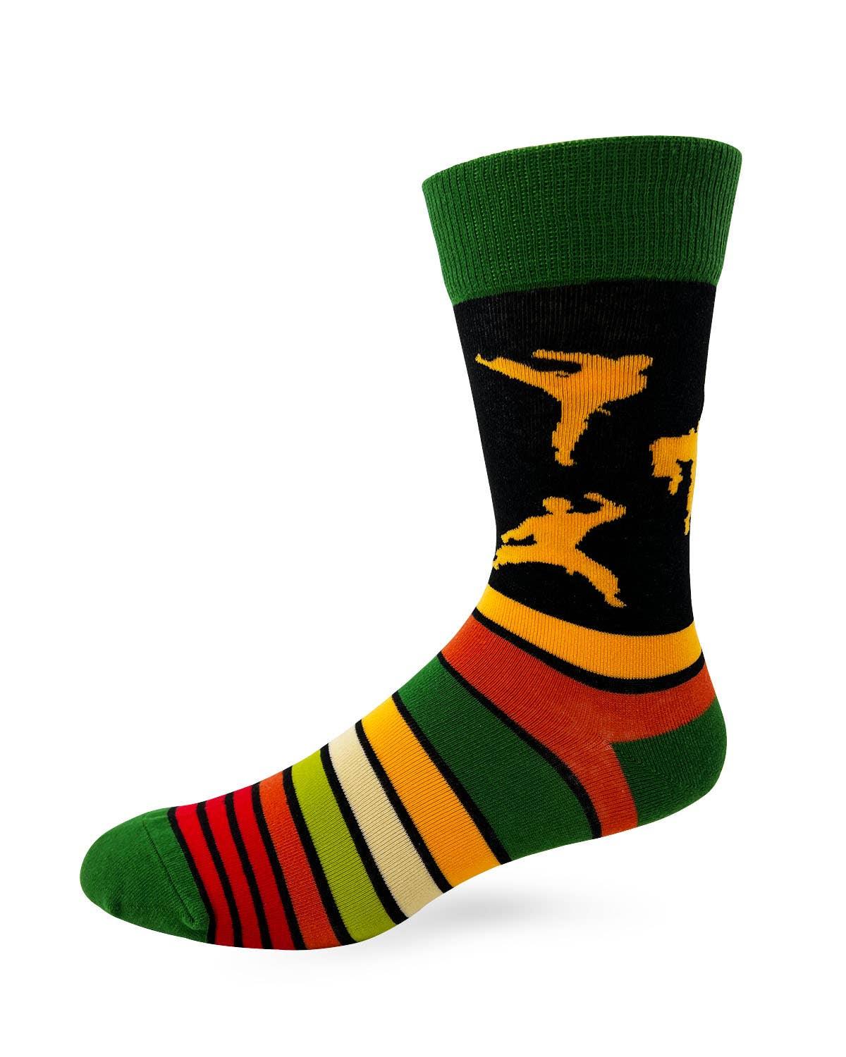 Men's novelty crew sock, black with green cuff, yellow karate silhouettes and stripes