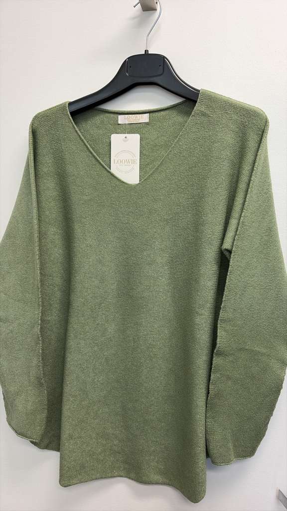Green V-neck knit sweater on hanger with long sleeves