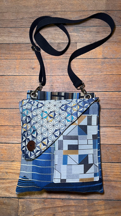 Saddlebag with geometric pattern on a wooden surface