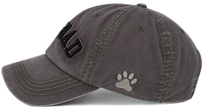 Dark grey washed cap with paw print graphic and small side logo, curved brim