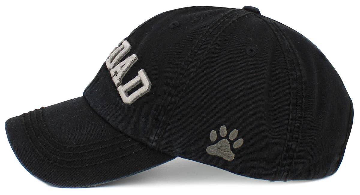 Black washed cap with paw print graphic on side and curved brim