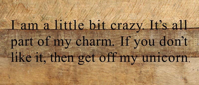 Reclaimed wood sign text: “I’m a little bit crazy…” unicorn quote, black print