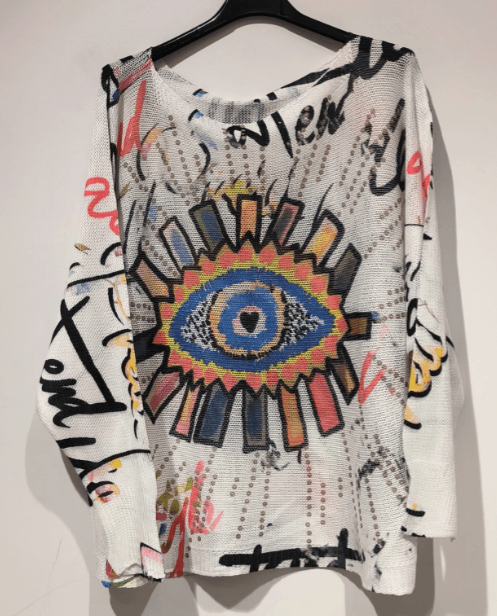 Round knit sweater, light base with multicolor evil-eye graphic, crew neck, long sleeves