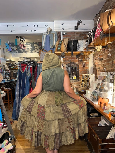 Olive patchwork maxi duster dress, back view with gathered hood and tiered skirt
