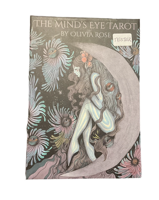Tarot deck cover featuring moon woman, floral eye motifs, and 'Mind’s Eye Tarot' text.