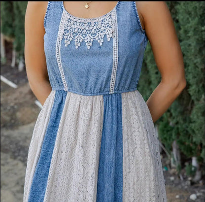 Detail shot of the lace trim hem and layered skirt of the boho midi dress.