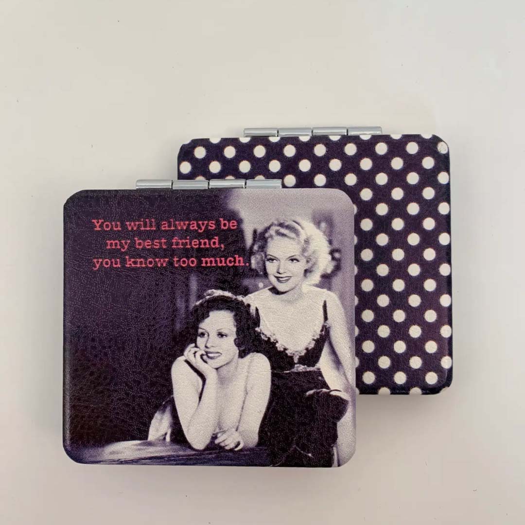Compact mirror with polka dot design featuring a vintage photo of two women and a quote.