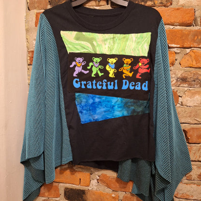 Grateful Dead handmade poncho with turquoise ribbed winged arms. A rainbow of grateful dead dancing bears are stitched on to the front.