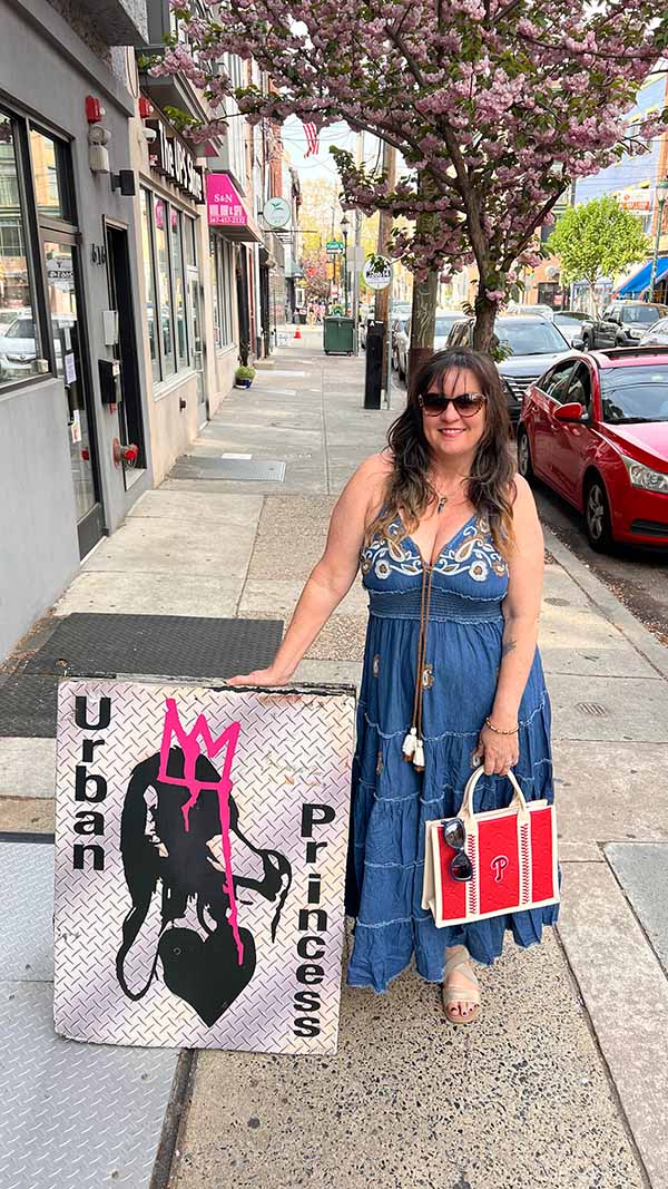 Dark denim maxi dress outfit styled with a Phillies tote bag on 4th and South Streets in Queen Village