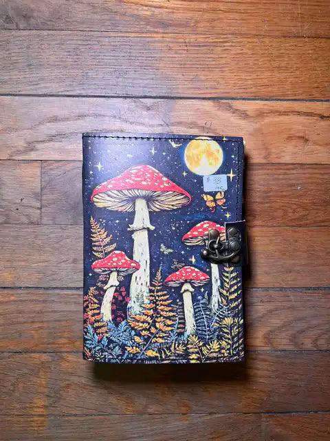 Spiritual journal cover with night sky mushrooms and yellow moon, metal clasp on right