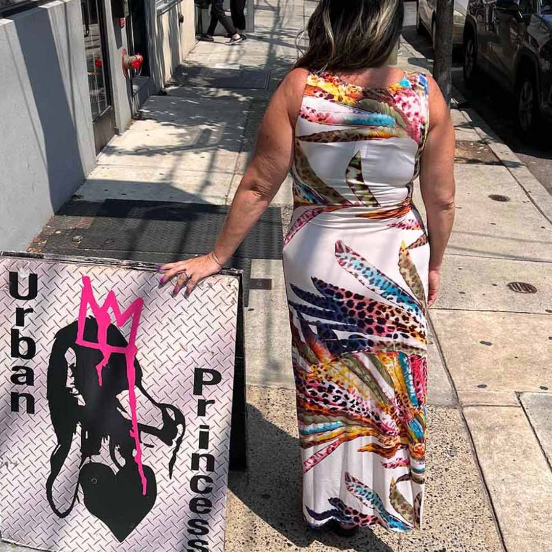 model wearing plunging v-dress showing the back of the dress