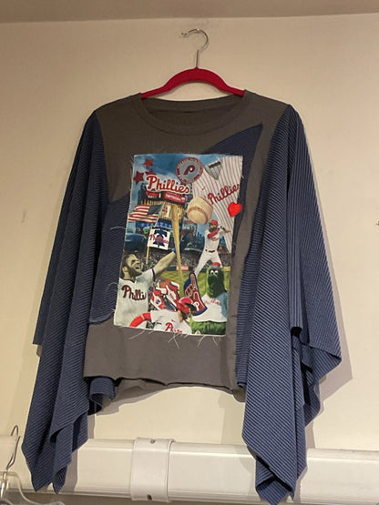 Locally made custom Philadelphia Phillies Game Day Poncho with super soft ribbed navy material as the wing and a Philadelphia Phillies Collage patch hand sewn on the front