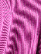 close up of the soft ribbed fabric in pink