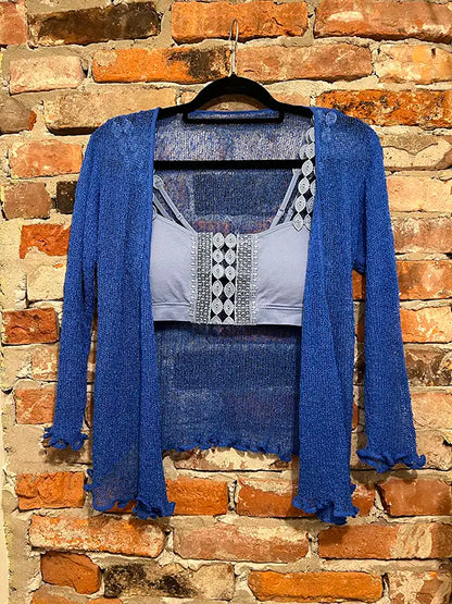 Royal blue textured shrug with open front, long sleeves, and scalloped hem.
