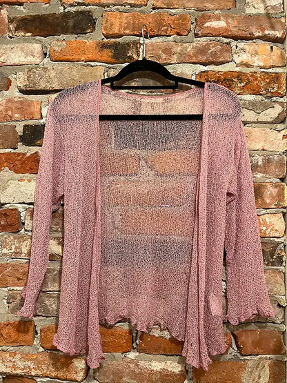 Mauve textured shrug with open front and long sleeves, scalloped hem.