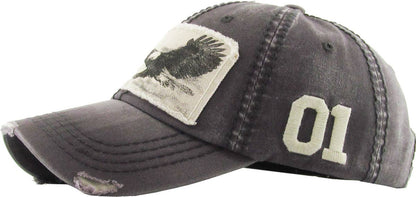 The side view of a distressed vintage ball cap with a picture of an eagle embroidered on. It is a worn Olive fabric. On a the eagles. background. Featuring the number one like Jalen hurts from