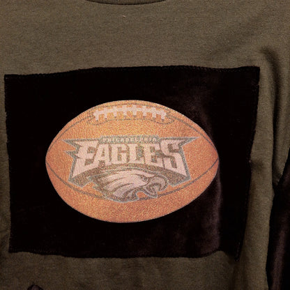 Sparkly Eagles Football Patch. This is a closeup of the front of the Eagles Poncho
