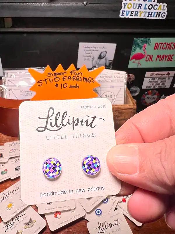 Novelty stud earrings with purple checkered disco ball charms
