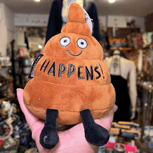 Orange poop emoji plush with smiling face and 'HAPPENS!' text
