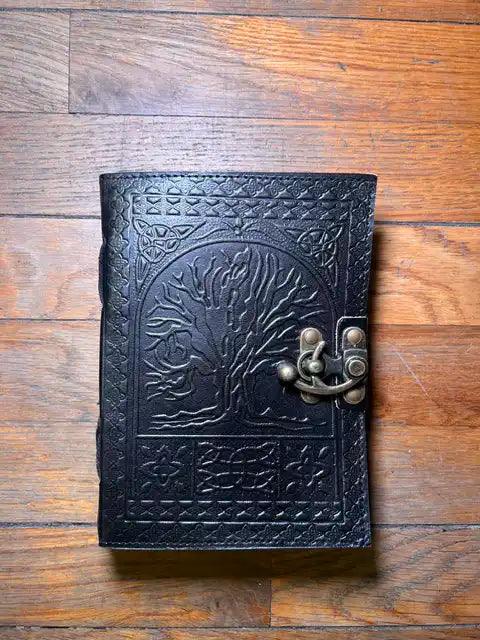 Spiritual journal cover with embossed tree of life pattern and metal clasp