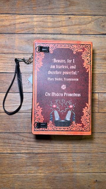 Decorative collectors book with a back cover quote and design on a  wooden surface