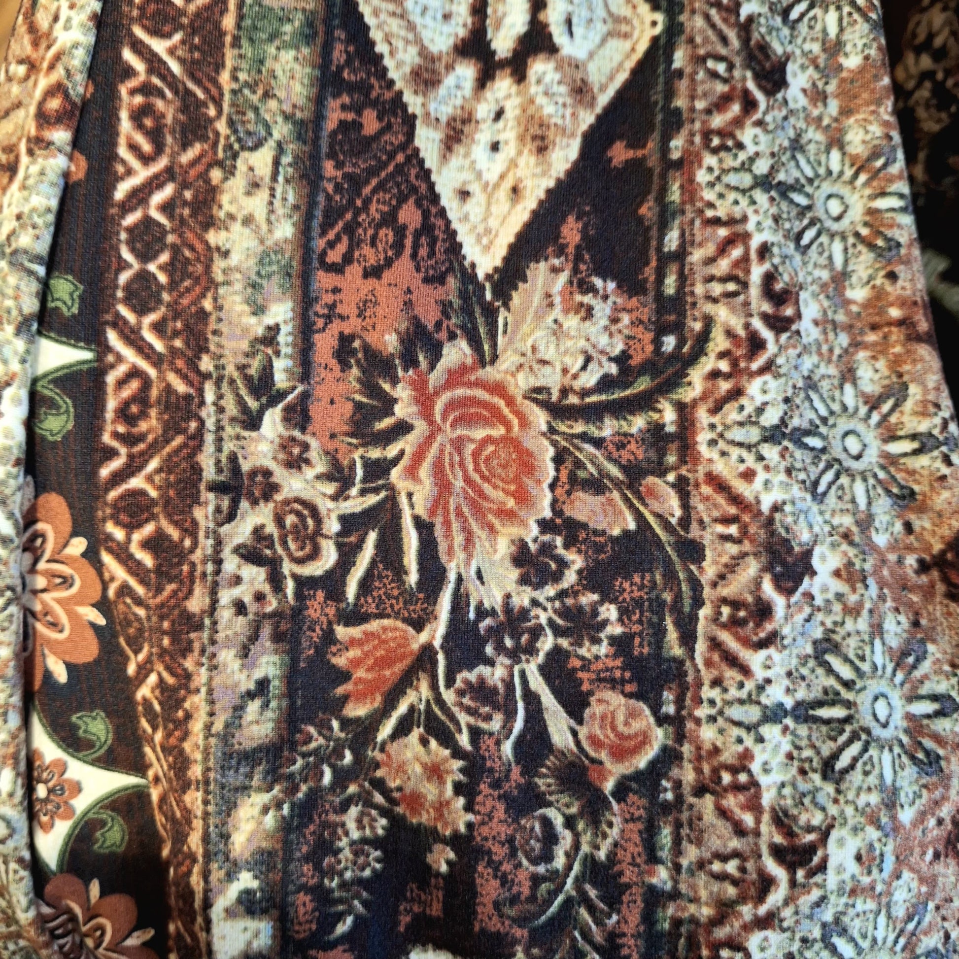 Flare leggings with multicolor boho patchwork print and floral motif