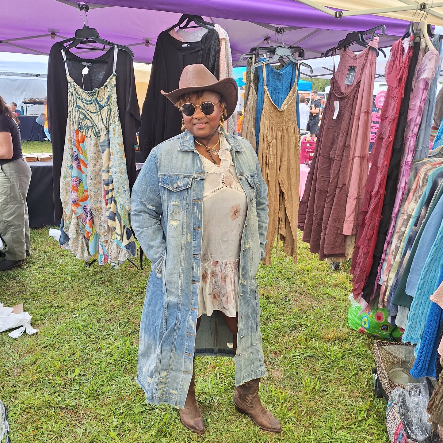 Long light-blue distressed denim duster jacket with button-front and patch pockets