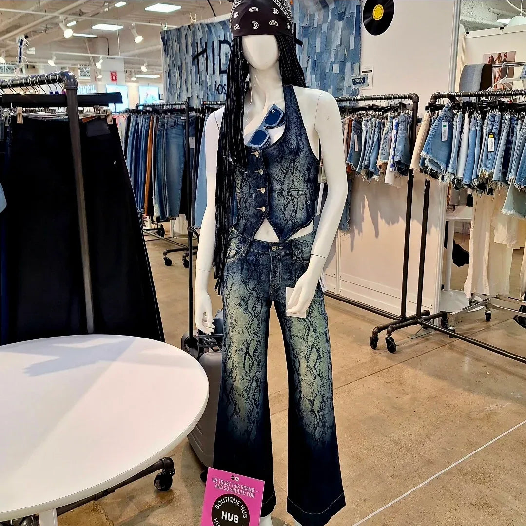 rockstar mannewuin in snakeskin denim matching set in store setting